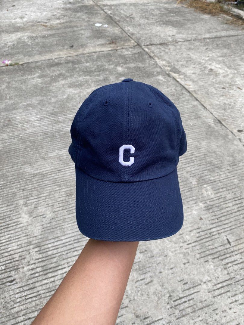 Navy Blue Covernat Cap with 'C' Logo (Category: Caps & Hats) located in Davao. Submitted by chazethrift (Listing ID 1461015806, Image 1). Description: - Navy blue baseball cap by Covernat - Features white embroidered 'C' on the front - 'COVERNAT' embroidered on the back - Adjustable strap for a custom fit - Clean and classic design, perfect for daily wear.