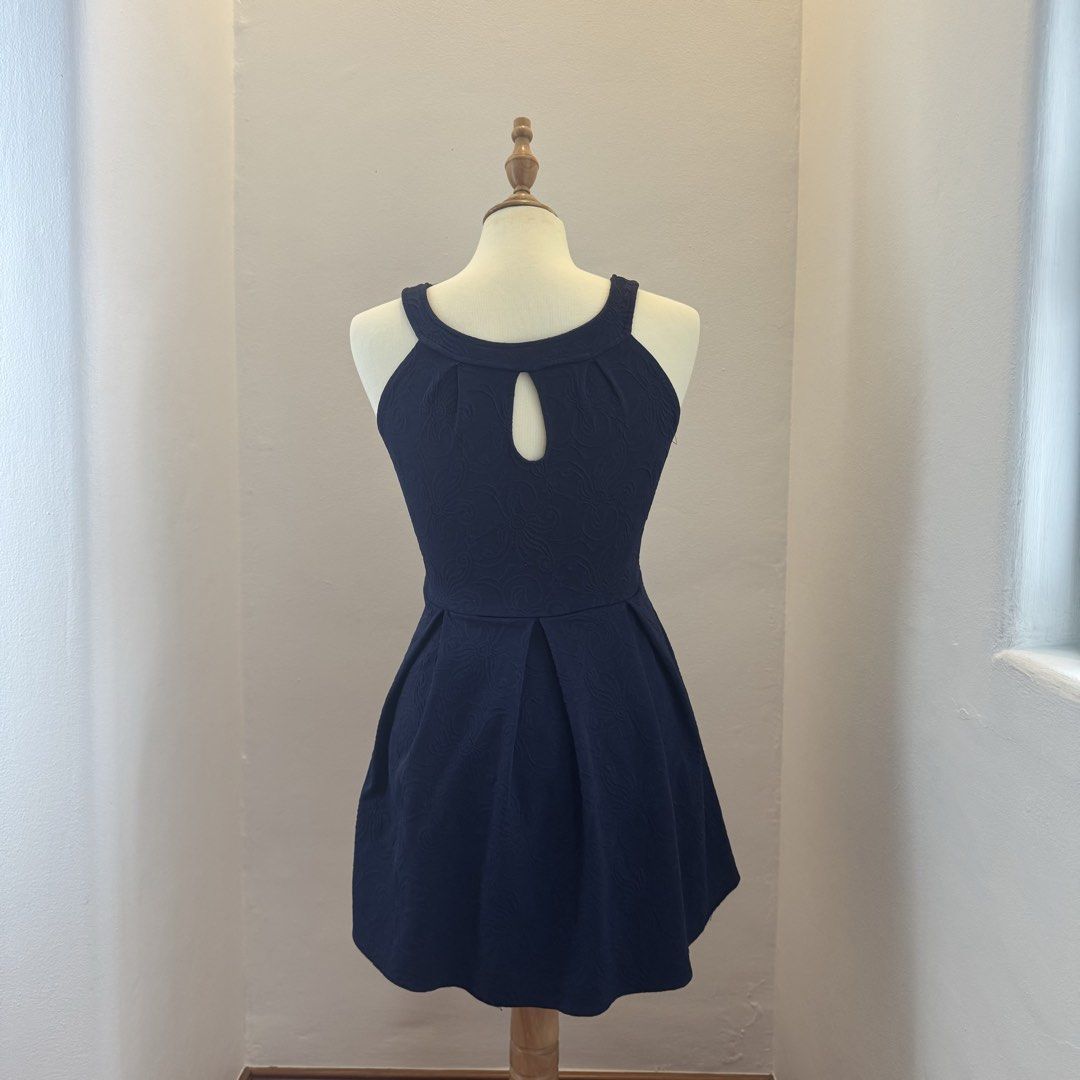navy blue embroidered pattern skater dress (Category: Dresses) located in Pasay City. Submitted by ultzen (Listing ID 1460939018, Image 3). Description: - navy blue halter skater dress - size S fits up to M - perfect for casual hangouts or dates - with some threading flaws (see pics) - rfs: doesn’t fit me anymore mop: bpi / gcash / maribank mod: j&t / lbc / sdd (mnl).