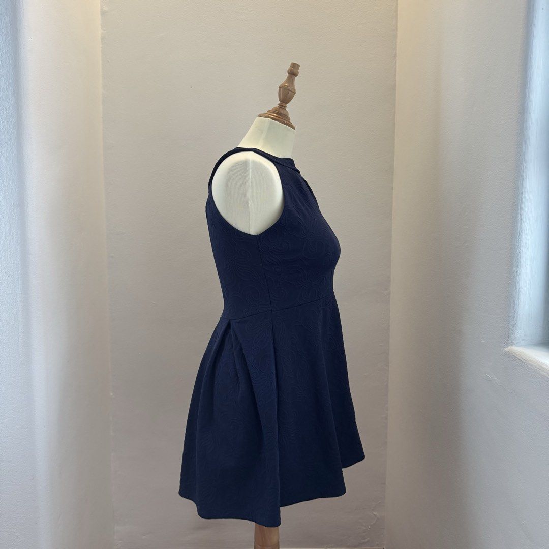 navy blue embroidered pattern skater dress (Category: Dresses) located in Pasay City. Submitted by ultzen (Listing ID 1460939018, Image 2). Description: - navy blue halter skater dress - size S fits up to M - perfect for casual hangouts or dates - with some threading flaws (see pics) - rfs: doesn’t fit me anymore mop: bpi / gcash / maribank mod: j&t / lbc / sdd (mnl).