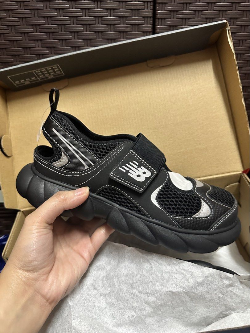 New Balance 230 kids (Category: Babies & Kids Fashion) located in Manila. Submitted by assej19 (Listing ID 1461025223, Image 3). Description: - Brand: New Balance 230 - Size: 3.5 US / 35.5 eu - Color: Black with silver accents - Closure: Velcro strap for easy on and off - Material: Breathable mesh - Condition: Comes in original box Rfs: wrong size.