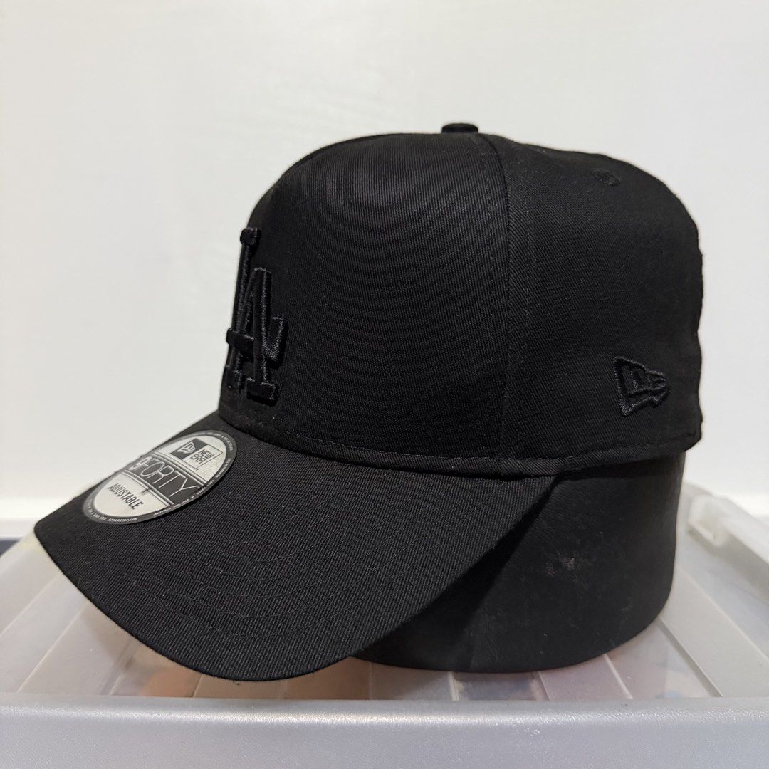 New Era LA Dodgers Cap (Category: Caps & Hats) located in Davao. Submitted by ckkb1821 (Listing ID 1461062848, Image 2). Description: New Era LA Dodgers Snapback Cap OSFM - One size fits most Triple Black Colorway Excellent condition, washed & cleaned ₱1,599 only +SF.