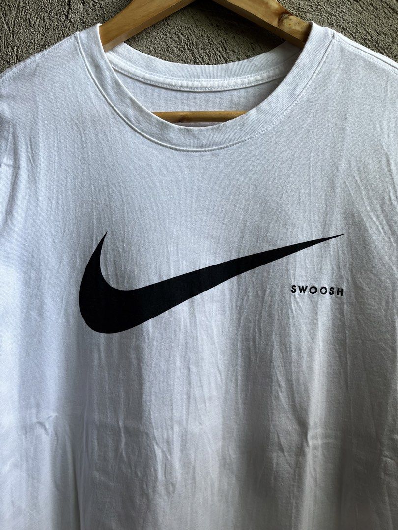 NIKE BIG SWOOSH EMBROIDERED (Category: Tshirts & Polo Shirts ) located in Cagayan de Oro. Submitted by rewornthriftph (Listing ID 1460922581, Image 2). Description: width: 21 length: 28 medium to large | OVERSIZED also on small Color rate: 9.5/10 Issue: In EXCELLENT Condition See details and reference on slides Payment Methods: GCASH/JNT PLS MANAGE YOUR EXPECTATIONS. THRIFT ITEMS, NO CANCELLATION ₱500.