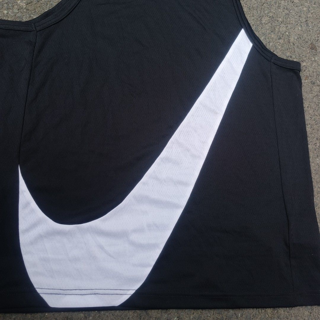 Nike big swoosh sando jersey (Category: Activewear) located in Taguig. Submitted by oswyn_thrifts (Listing ID 1460921190, Image 3). Description: Nike Big Swoosh sando jersey excellent condition no discoloration Large on tag Dimes: W-22 L-29 700+sf Taguig loc.