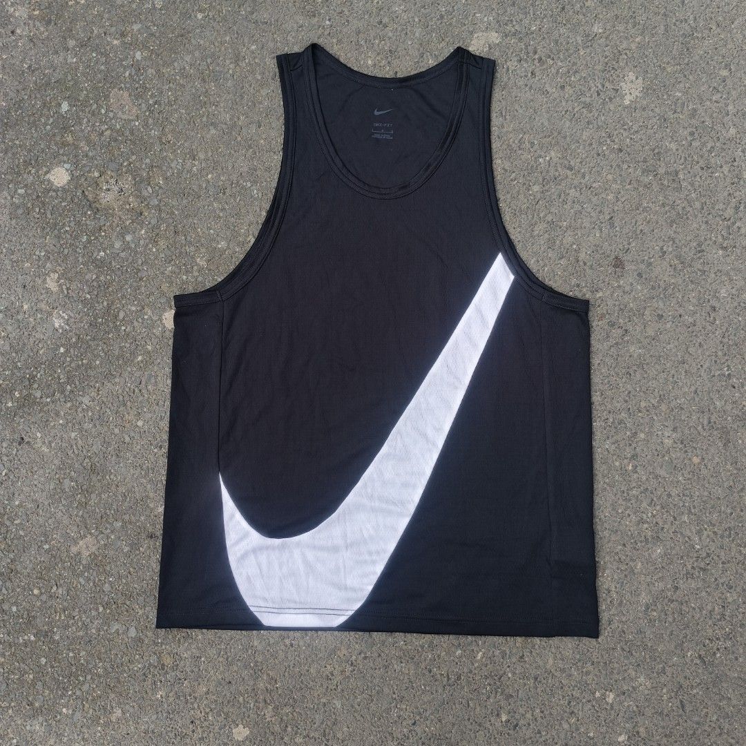 Nike big swoosh sando jersey (Category: Activewear) located in Taguig. Submitted by oswyn_thrifts (Listing ID 1460921190, Image 1). Description: Nike Big Swoosh sando jersey excellent condition no discoloration Large on tag Dimes: W-22 L-29 700+sf Taguig loc.