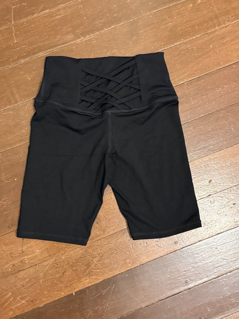 Nike Black High-Waisted Biker Shorts (Category: Shorts) located in Angeles City. Submitted by lesmiz24601 (Listing ID 1460978477, Image 2). Description: - Black Nike biker shorts - High-waisted fit for a flattering silhouette - Unique criss-cross detail at the back waistband - Comfortable and stretchy material for maximum flexibility - Perfect for workouts, gym sessions, or casual everyday wear.