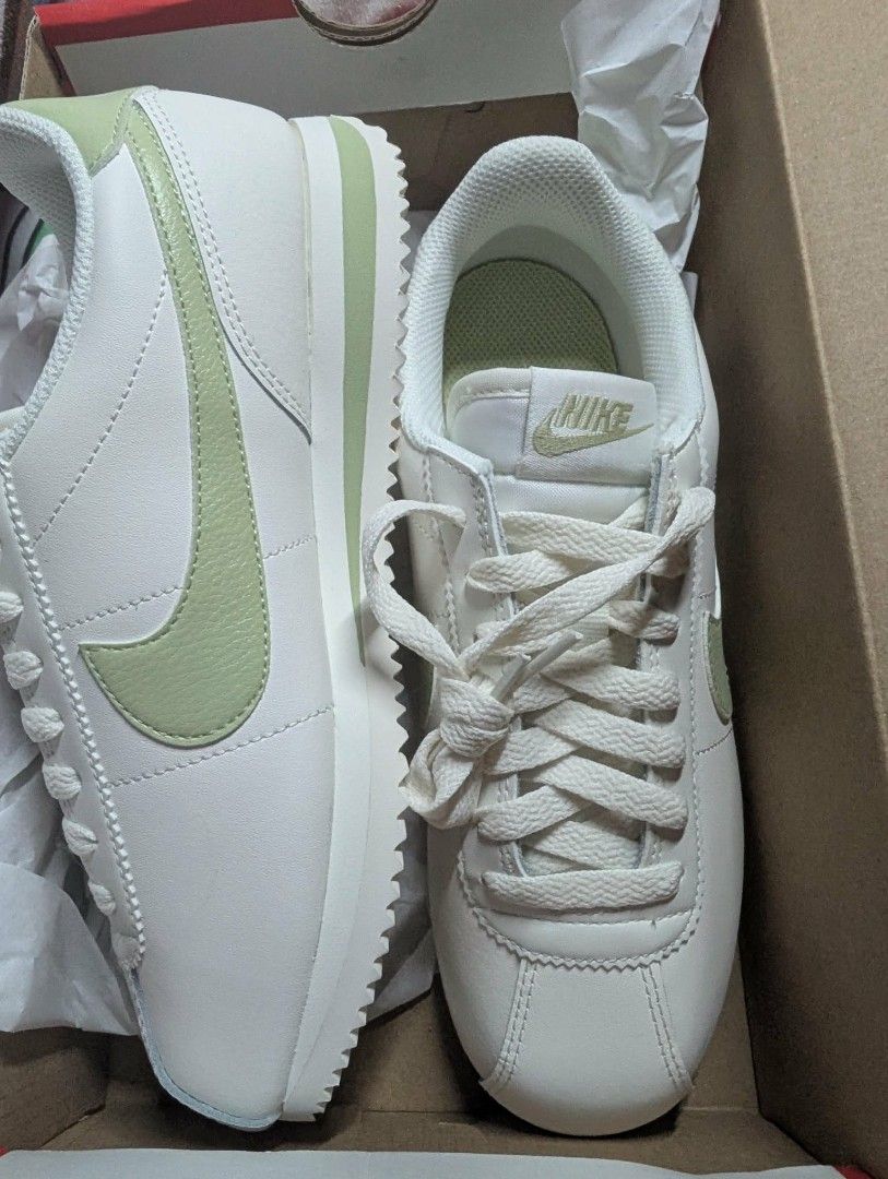Nike Cortez White Light Green Sneakers (Category: Sneakers) located in Pasay City. Submitted by jaydee05 (Listing ID 1461112259, Image 2). Description: - Classic Nike Cortez sneakers - White leather with light green swoosh and heel tab - Includes original box and packaging - Ideal for casual wear - Comfortable and stylish design No issues brand new Original RFS- DECLUTTERING.