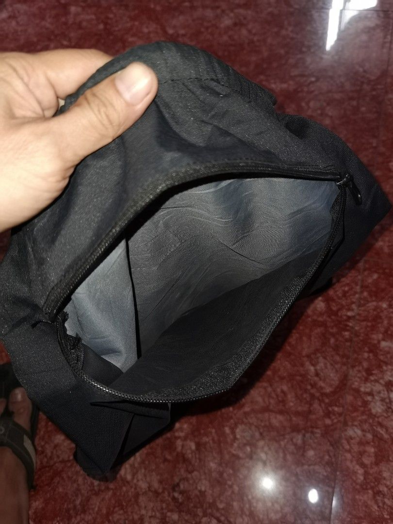 Nike Drawstring Bag (Category: Backpacks) located in Caloocan City. Submitted by cooldudeszion (Listing ID 1460922473, Image 3). Description: - Authentic Nike drawstring bag - Ideal for gym, sports, or everyday essentials - Spacious main compartment - Convenient front zippered pocket for secure storage - Made from durable nylon or polyester material - Lightweight and easy to carry Brand new condition What you see is what you get North caloocan Br