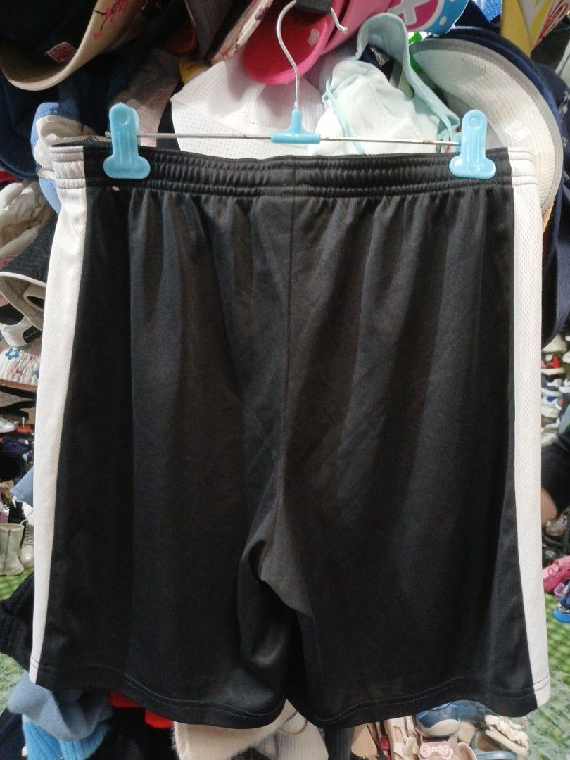 Nike Dri-FIT Shorts (Category: Activewear) located in La Trinidad. Submitted by dashopperist (Listing ID 1460928565, Image 2). Description: - Brand: Nike - Feature: Dri-FIT technology - Fit: Slim fit - Size: Medium (M) - Color: Black - Details: Elastic waistband with drawstring, white side stripe - Ideal for: Running, training - Origin: Made in Vietnam.