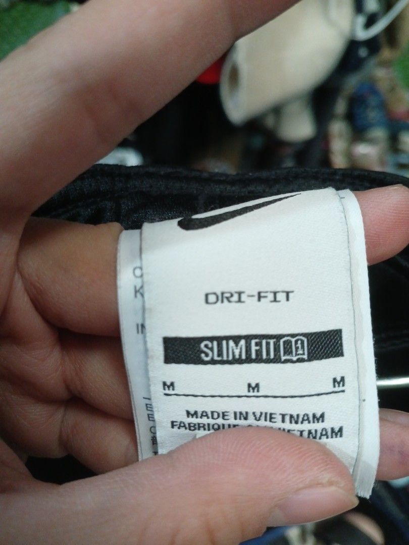 Nike Dri-FIT Shorts (Category: Activewear) located in La Trinidad. Submitted by dashopperist (Listing ID 1460928565, Image 3). Description: - Brand: Nike - Feature: Dri-FIT technology - Fit: Slim fit - Size: Medium (M) - Color: Black - Details: Elastic waistband with drawstring, white side stripe - Ideal for: Running, training - Origin: Made in Vietnam.