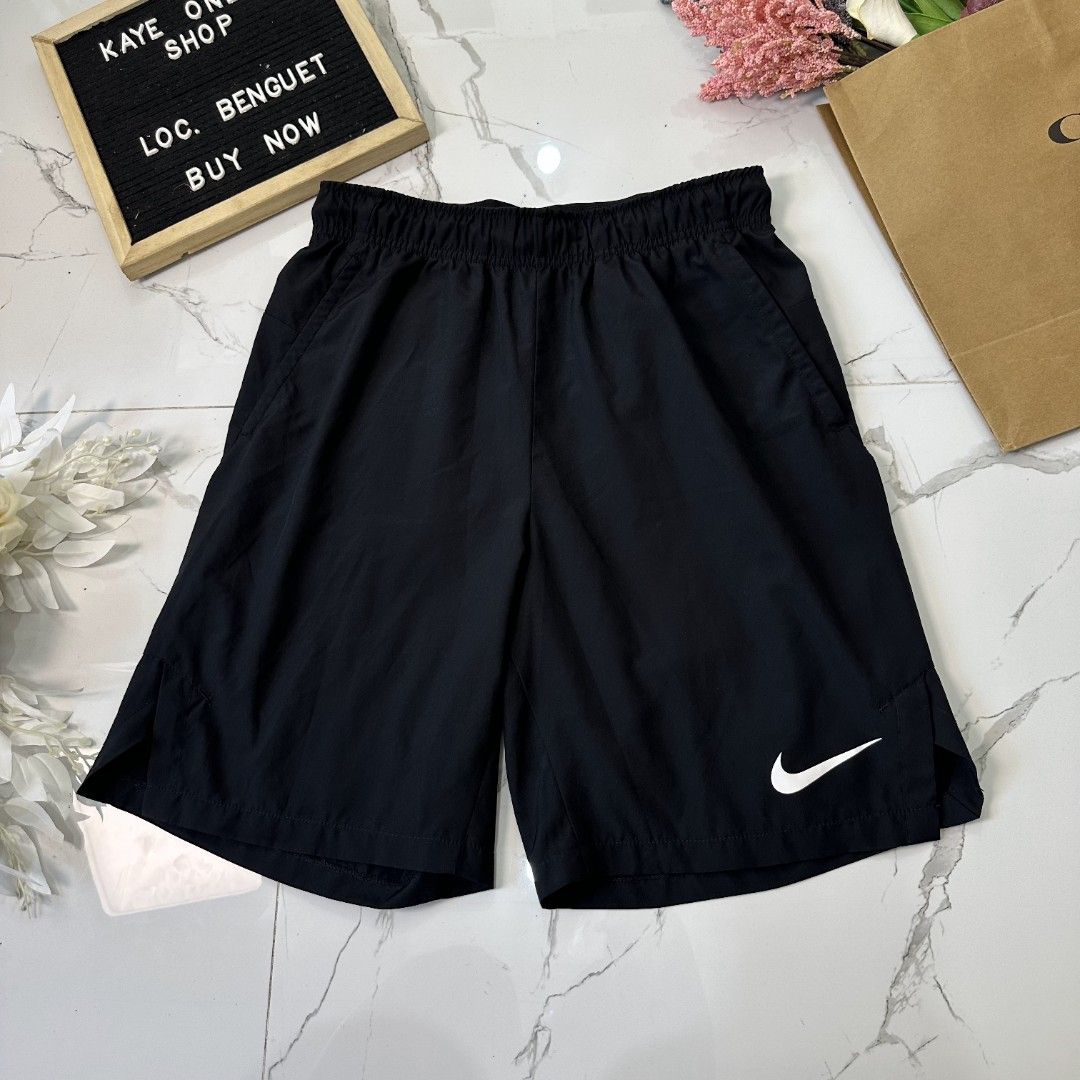 Nike dri-fit shorts (Category: Shorts) located in Baguio. Submitted by kayeonlineshop (Listing ID 1461022192, Image 1). Description: black Nike Dri-FIT training shorts featuring an elastic waistband and a white Swoosh logo on the lower left leg.