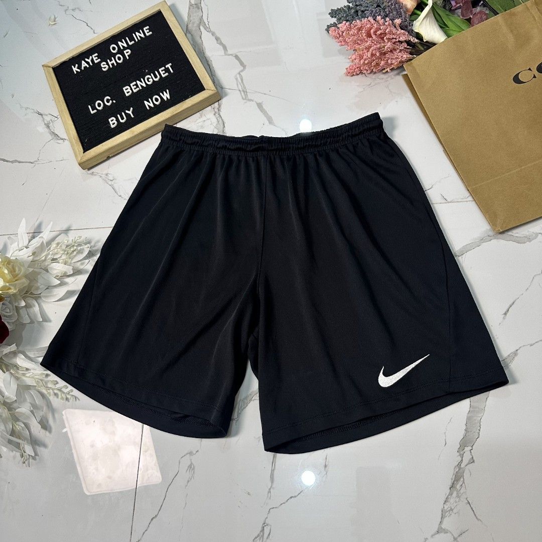 Nike dri-fit shorts (Category: Shorts) located in Baguio. Submitted by kayeonlineshop (Listing ID 1461022192, Image 2). Description: black Nike Dri-FIT training shorts featuring an elastic waistband and a white Swoosh logo on the lower left leg.