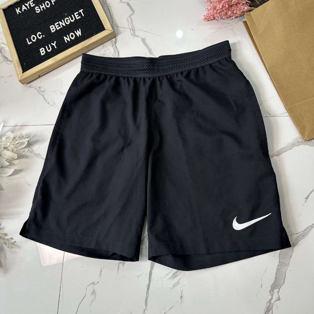 Nike dri-fit Shorts (Category: Shorts) located in Baguio. Submitted by kayeonlineshop (Listing ID 1461023484, Image 2). Description: black Nike Dri-FIT athletic shorts featuring an elastic waistband and a white Nike Swoosh logo on the lower left leg. l17 w28-32.