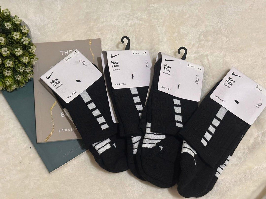 Nike Elite Basketball Socks (1 Pair) (Category: Socks) located in Manila. Submitted by ayawniyotaponkoto (Listing ID 1460960170, Image 2). Description: - 3 pairs of Nike Elite basketball socks - Classic black with white stripes - Features Dri-FIT technology for sweat-wicking - Size L (fits 26-28 cm foot length) - Ideal for basketball, other sports, or everyday comfort.