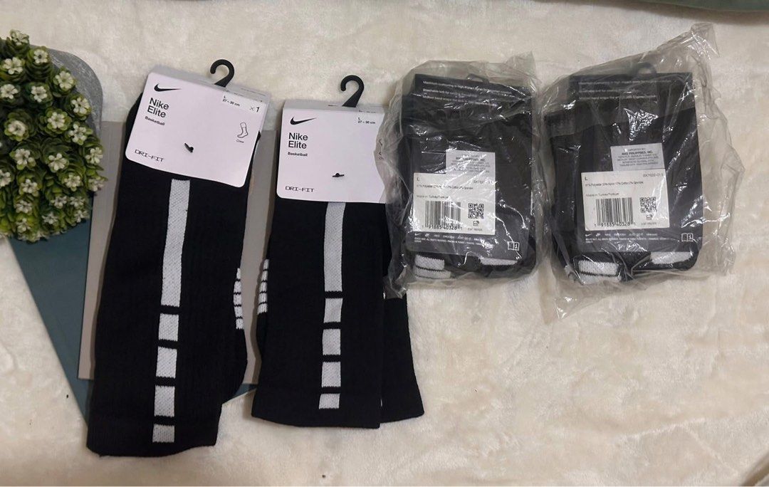 Nike Elite Basketball Socks (1 Pair) (Category: Socks) located in Manila. Submitted by ayawniyotaponkoto (Listing ID 1460960170, Image 1). Description: - 3 pairs of Nike Elite basketball socks - Classic black with white stripes - Features Dri-FIT technology for sweat-wicking - Size L (fits 26-28 cm foot length) - Ideal for basketball, other sports, or everyday comfort.