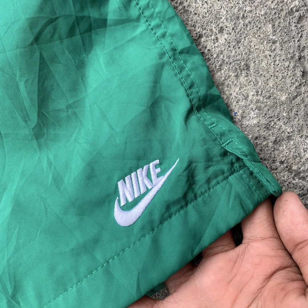 Nike Green Polyester Shorts Size M (Category: Shorts) located in Polangui. Submitted by b0ssl00ts (Listing ID 1460929692, Image 2). Description: - Brand: Nike - Type: Athletic Shorts - Size: Medium (M) - Material: 100% Polyester - Features: Elastic waistband with drawstring, one back pocket - Ideal for: Sports, workouts, or casual wear.