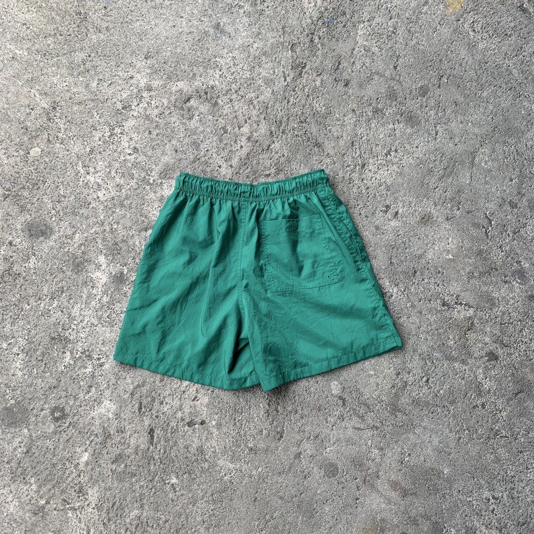 Nike Green Polyester Shorts Size M (Category: Shorts) located in Polangui. Submitted by b0ssl00ts (Listing ID 1460929692, Image 3). Description: - Brand: Nike - Type: Athletic Shorts - Size: Medium (M) - Material: 100% Polyester - Features: Elastic waistband with drawstring, one back pocket - Ideal for: Sports, workouts, or casual wear.
