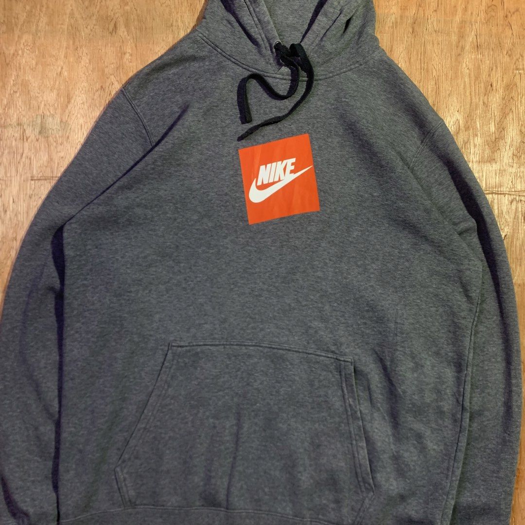 Nike Grey Hoodie with Orange Box Logo (Category: Hoodies) located in Manila. Submitted by icemike444 (Listing ID 1461097404, Image 3). Description: - Grey Nike hoodie - Classic orange box logo on chest - Front pocket - Drawstring hood - Made from soft, comfortable material - Ideal for casual wear - Brand new with tag still attention Dimes 23.5x28 Color rate 9.7/10 Honestly no issue Excellent condition .
