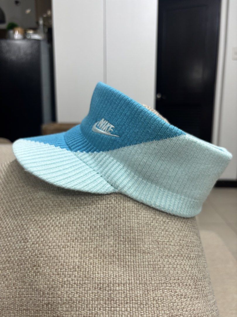 Nike Knit Visor Hat Blue (Category: Hats & Beanies) located in Taguig. Submitted by wena11 (Listing ID 1461071937, Image 2). Description: - Nike knit visor - Colorblock design: blue and light blue - Embroidered Nike logo on front - Ideal for sunny days and sports - Comfortable knit material *barely used .