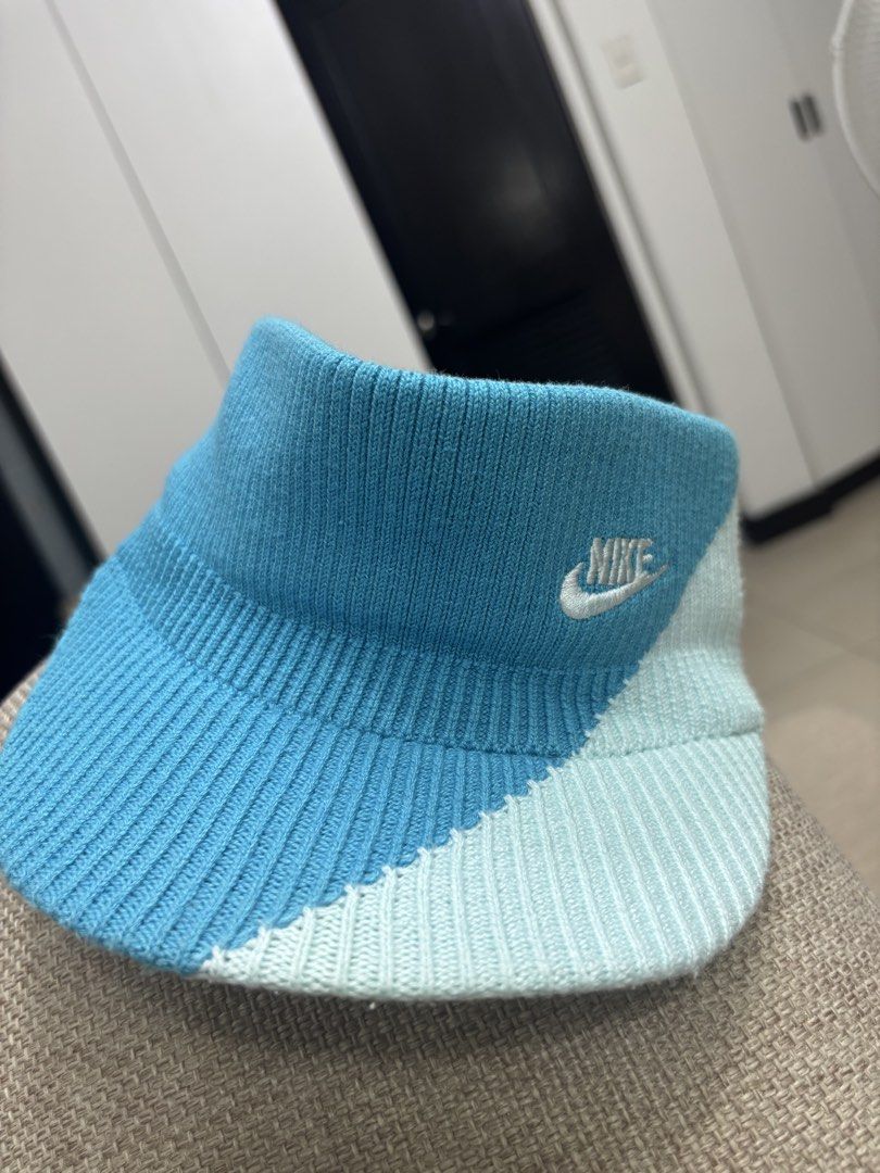 Nike Knit Visor Hat Blue (Category: Hats & Beanies) located in Taguig. Submitted by wena11 (Listing ID 1461071937, Image 3). Description: - Nike knit visor - Colorblock design: blue and light blue - Embroidered Nike logo on front - Ideal for sunny days and sports - Comfortable knit material *barely used .