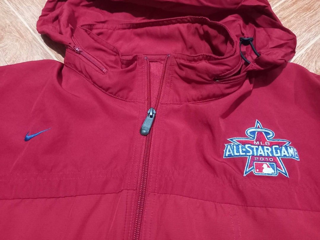 Nike MLB All-Star Game 2010 Red Hooded Jacket (Category: Coats, Jackets and Outerwear) located in Baguio. Submitted by jiannisthriftfits (Listing ID 1460971742, Image 1). Description: - Authentic Red Nike Jacket for the 2010 MLB All-Star Game - Features a convenient hood and full zip closure - Official MLB All-Star Game logo embroidered on the chest - Nike swoosh also embroidered for brand authenticity - Includes practical side pockets for storag