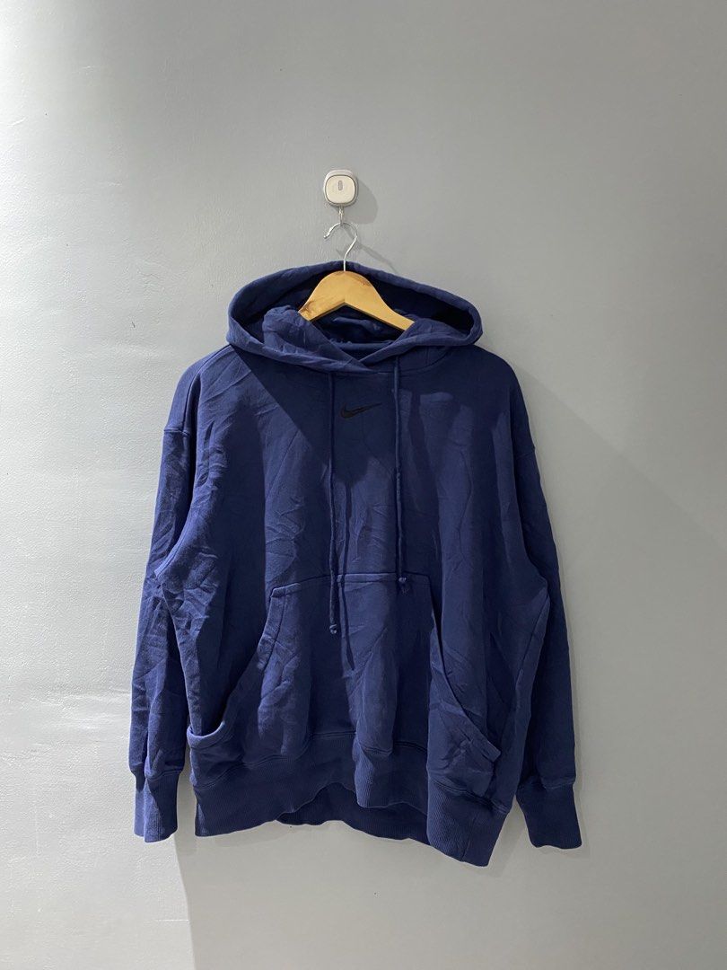 Nike Navy Blue Hoodie Size S (Category: Hoodies) located in Bangued. Submitted by koroysthrifts (Listing ID 1461056406, Image 2). Description: - Nike hoodie - Color: Navy blue -25x25 Boxy - Size: S - Made in: Jordan - Condition: Comfy, but has a dark purple stain on the sleeve. Please check the last photo for details..