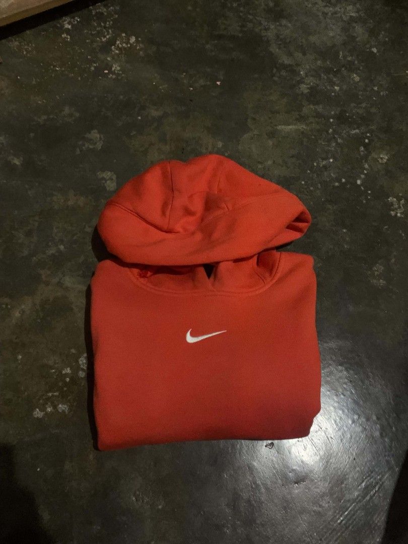 Nike Red Hoodie (Category: Hoodies) located in Caloocan City. Submitted by emmanshop (Listing ID 1461050488, Image 3). Description: - Classic red Nike hoodie - Iconic small swoosh logo on chest - Front pocket - Hooded design - Comfortable and stylish for casual wear.