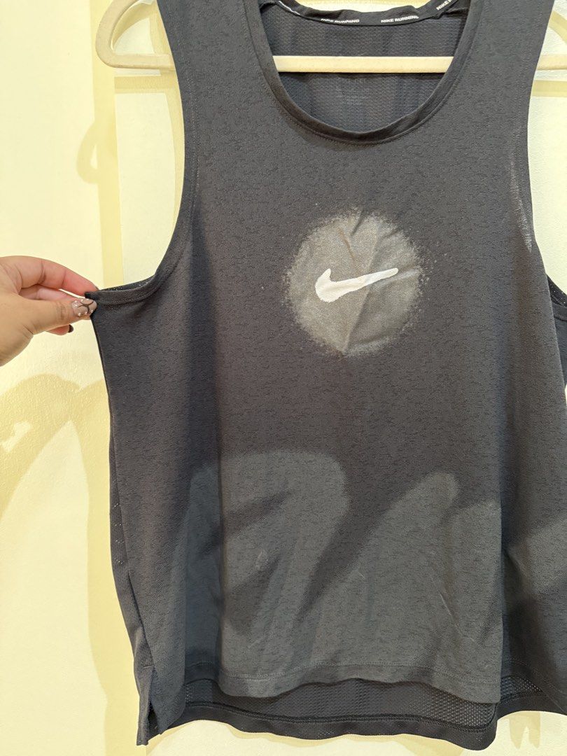 Nike Running Dri-FIT Tank Top Black (Category: Activewear) located in Cagayan de Oro. Submitted by soidee (Listing ID 1461079391, Image 3). Description: - Black Nike Dri-FIT running tank top - Features iconic Nike swoosh logo - Size S - Perfect for workouts or everyday casual wear.