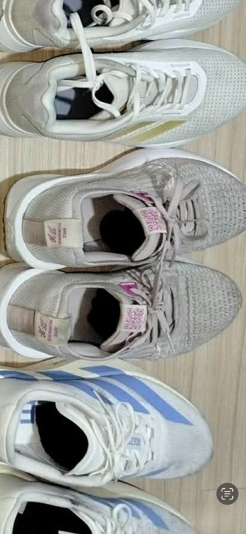 Nike Running Shoes (Category: Sneakers) located in Quezon City. Submitted by quinzstacey_617 (Listing ID 1461084131, Image 2). Description: - Adidas running shoes - Light grey with pink accents - Breathable mesh upper - Grey laces - Ideal for running or everyday wear Size: Location: Tondo, Manila.