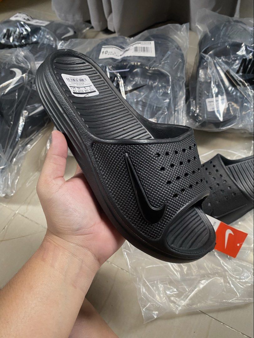 Nike Solarsoft Slides (Category: Slippers & Slides) located in Taguig. Submitted by courtsidecollection (Listing ID 1461114817, Image 2). Description: - Black Nike Slides - Comfortable and easy to wear - Ideal for casual outings or after sports - Comes in original packaging - Get yours now! Black/ White : 40-45 Mens 36-40 Womens All black : 40-45 mens Msg for the price :).