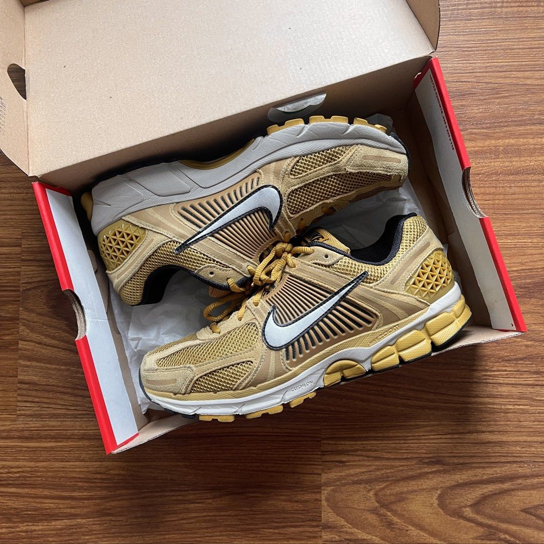 Nike Vomero 5 'Ochre Flat Gold' (Category: Sneakers) located in Pasig City. Submitted by crewkicks.ph (Listing ID 1460975445, Image 1). Description: Nike Vomero 5 'Ochre Flat Gold' Size 10 US M Used 3x Complete OG ₱ 3,998 ONLY! + 1.5K TV.