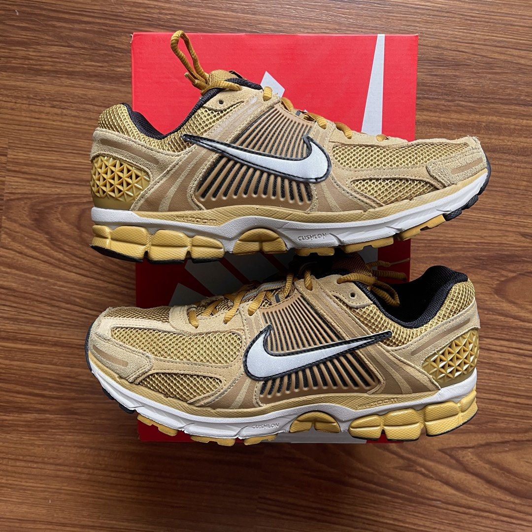 Nike Vomero 5 'Ochre Flat Gold' (Category: Sneakers) located in Pasig City. Submitted by crewkicks.ph (Listing ID 1460975445, Image 2). Description: Nike Vomero 5 'Ochre Flat Gold' Size 10 US M Used 3x Complete OG ₱ 3,998 ONLY! + 1.5K TV.