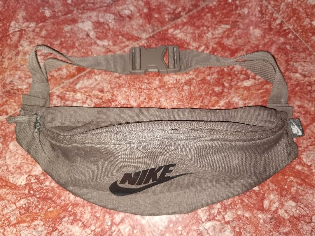 Nike Waist Bag Fanny Pack (Category: Belt bags, Clutches and Pouches) located in Caloocan City. Submitted by cooldudeszion (Listing ID 1460968145, Image 1). Description: - Grey Nike waist bag - Main zippered compartment - Inner mesh pocket - Adjustable strap with buckle closure - Ideal for keeping essentials handy - Great for travel or everyday use Almost new What you see is what you get North caloocan Brgy 176 09325825702 #TnxAdminGodbless .