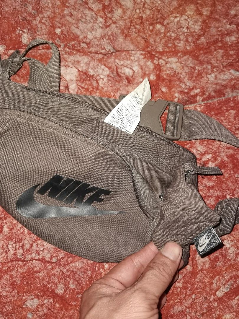 Nike Waist Bag Fanny Pack (Category: Belt bags, Clutches and Pouches) located in Caloocan City. Submitted by cooldudeszion (Listing ID 1460968145, Image 2). Description: - Grey Nike waist bag - Main zippered compartment - Inner mesh pocket - Adjustable strap with buckle closure - Ideal for keeping essentials handy - Great for travel or everyday use Almost new What you see is what you get North caloocan Brgy 176 09325825702 #TnxAdminGodbless .