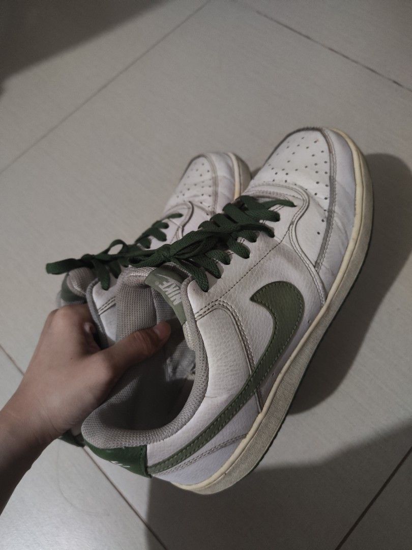 Nike White and Green Leather Sneakers (Category: Sneakers) located in Manila. Submitted by favefinds___ (Listing ID 1461044493, Image 1). Description: - Classic Nike sneakers - White leather with green swoosh and heel tab - Green laces - Ideal for casual wear There's no problem with the shoes. You just only need to clean. Thank you. Just pm me for more information..