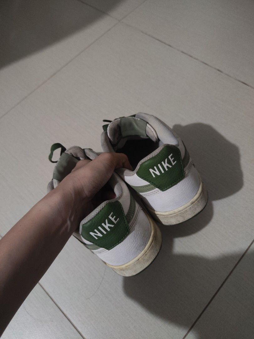Nike White and Green Leather Sneakers (Category: Sneakers) located in Manila. Submitted by favefinds___ (Listing ID 1461044493, Image 2). Description: - Classic Nike sneakers - White leather with green swoosh and heel tab - Green laces - Ideal for casual wear There's no problem with the shoes. You just only need to clean. Thank you. Just pm me for more information..