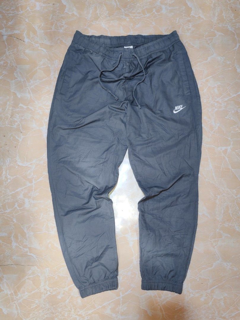 Nike woven jogger (Category: Joggers) located in Cotabato. Submitted by rayhan.thriftee (Listing ID 1461044230, Image 1). Description: Nike woven Jogger 33-36 waistline 40 length excellent condition no issue location cotabato city.