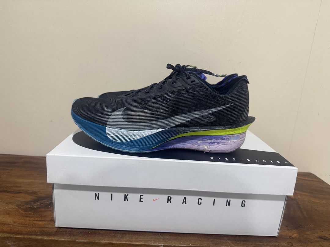 Nike ZoomX Vaporfly Next% 4 (Category: Sneakers) located in Pasay City. Submitted by josec03 (Listing ID 1461114371, Image 2). Description: Barely used. Never used on concrete or trail as seen from pictures. Only indoor gym and for weight training. SKU HF6414 401 Brand new price is P13,295. Verifiable via the Nike App Comes with 4 free Nike shirts. Size Small. .