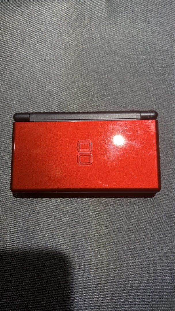 DS Lite (with box) (Category: Nintendo) located in Makati City. Submitted by quickforest.c2d50e (Listing ID 1461009113, Image 2). Description: Selling great condition DS Lite crimson Screen protectors installed RFS: got my grail onyx ds lite so no longer need this color Shipping fee shouldered by buyer.