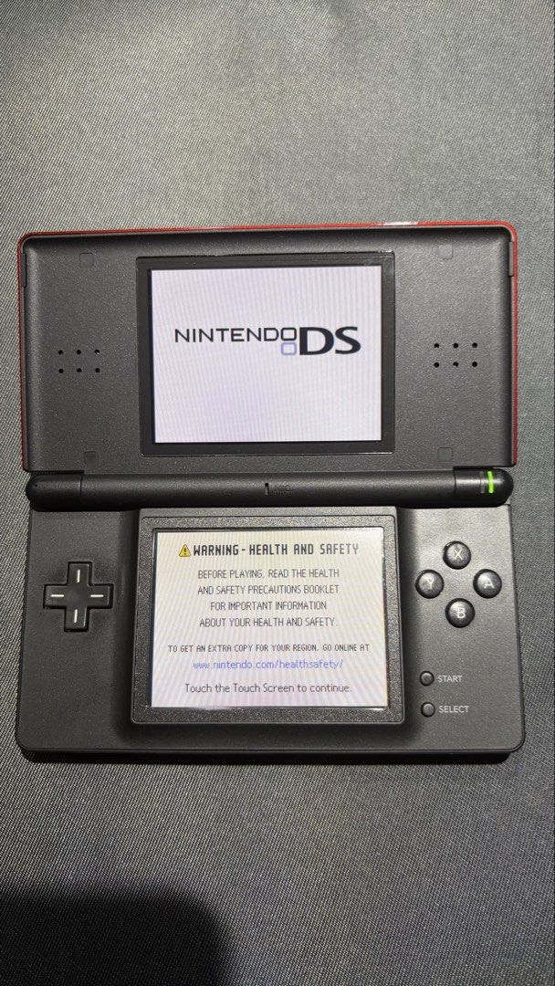 DS Lite (with box) (Category: Nintendo) located in Makati City. Submitted by quickforest.c2d50e (Listing ID 1461009113, Image 3). Description: Selling great condition DS Lite crimson Screen protectors installed RFS: got my grail onyx ds lite so no longer need this color Shipping fee shouldered by buyer.