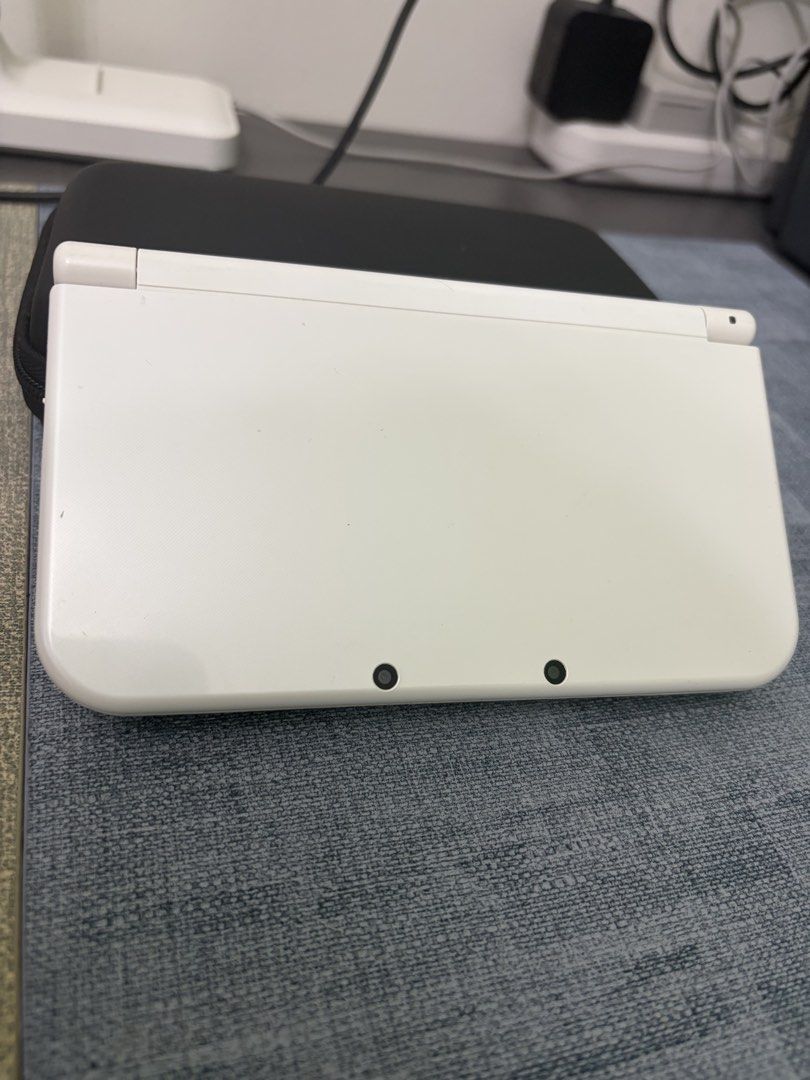 Nintendo New 3DS LL (Category: Nintendo) located in Makati City. Submitted by tommyyang.tw (Listing ID 1461093796, Image 2). Description: ★Nintendo New 3DS LL★ 🎮Color: White 🎮Version: Japanese 🎮Jailbreak: Yes 🎮Extra: 16GB SD Card (full of games) 🎮Charger: Included 🎮Case: Included 🎮Issues: No 💰Price: ₱18,500 (Negotiable) 💳Payment: GCash 🛵Delivery: Lalamove Direct message for photos or details!.