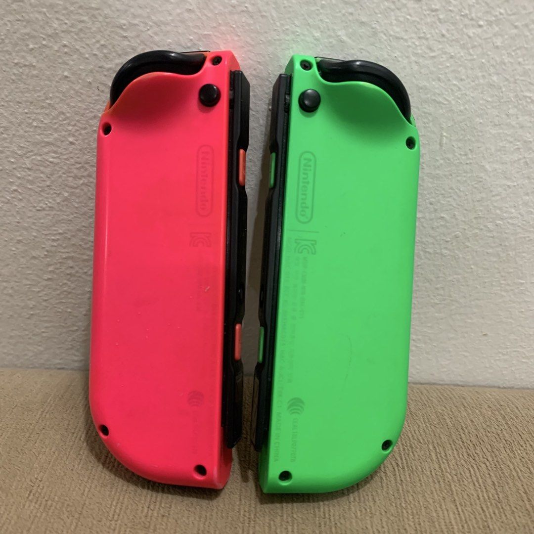 Nintendo Switch Joycons Green Pink (Category: Controllers) located in Imus. Submitted by shavogamingph (Listing ID 1461100970, Image 2). Description: Nintendo Switch Joycons Original Handheld lang nagagamit Hindi po nagagamit ng naka detach 📍 Imus Cavite Pick up/ Meetup Lalamove/ LBC 🛵 COD is Available.