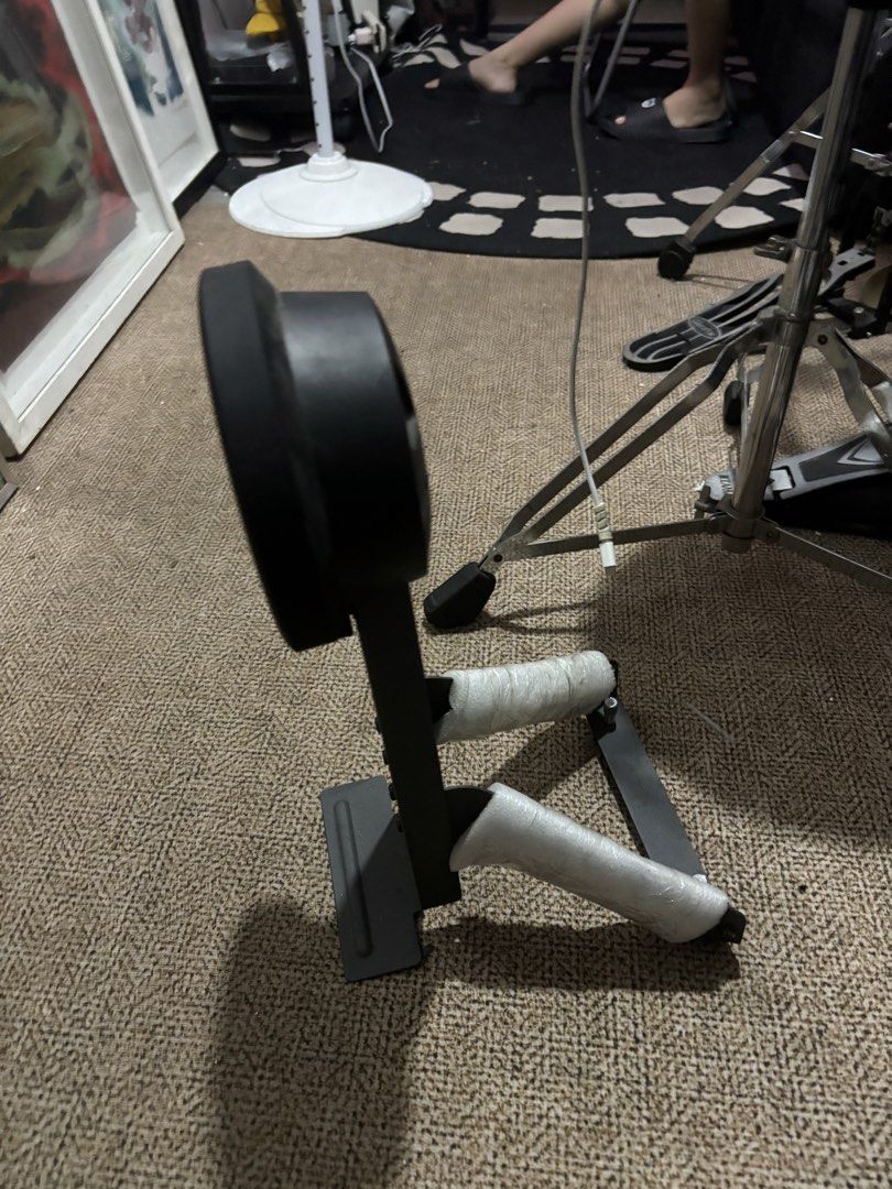 NUX edrums bass drum tower (Category: Musical Instruments) located in Pasig City. Submitted by akosidarius (Listing ID 1461066905, Image 1). Description: NUX -Hat practice pad. Great for quiet practice sessions. The pad is circular and black. The stand is black metal with white tape wrapped around the two foot pedals. It's a compact setup. Good for drummers who need to practice without making too much noise..