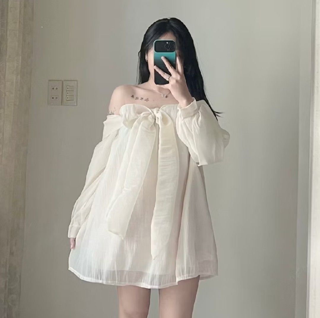 Off-shoulder Bow Dress (Category: Dresses) located in Manila. Submitted by djqflores (Listing ID 1460929171, Image 1). Description: - Off-shoulder design - Puff sleeves - Large bow detail in front - Lightweight and flowy fabric - Versatile for casual or special occasions - Easy to wear and style.