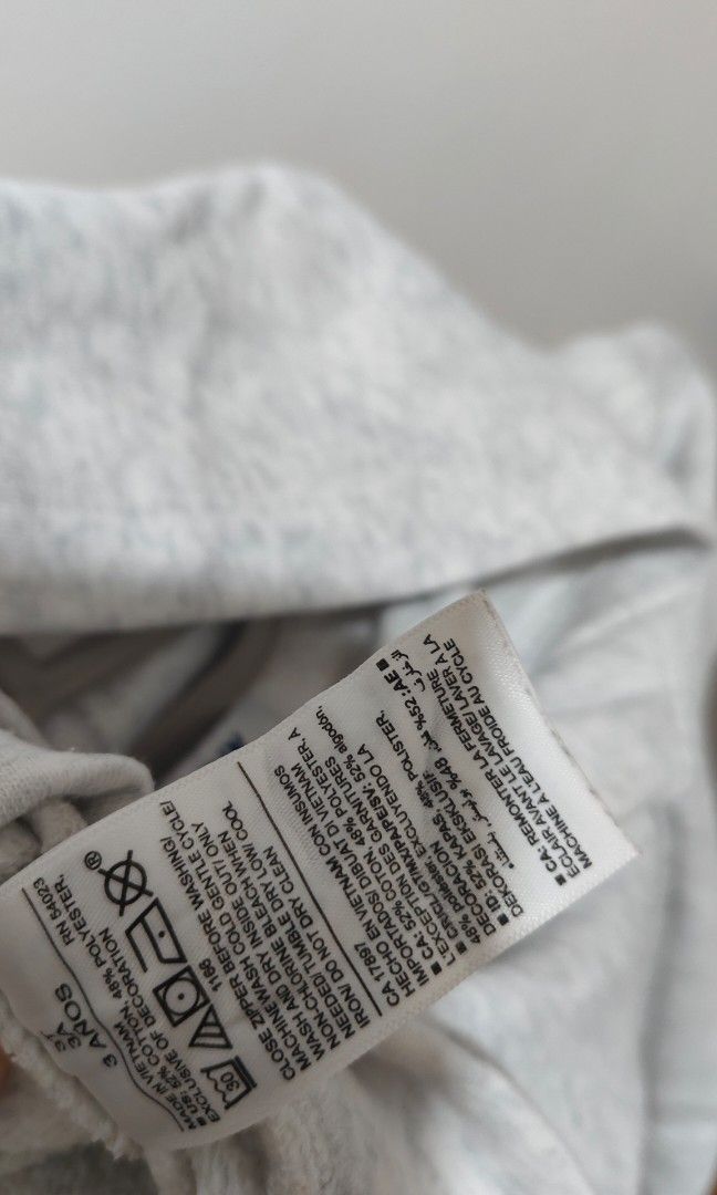 Old Navy Grey Sweatshirt 3 Years (Category: Babies & Kids Fashion) located in Caloocan City. Submitted by luckybunny_8888 (Listing ID 1460976659, Image 3). Description: - Brand: Old Navy - Size: 3 Years - Color: Grey - Material: 52% Cotton, 48% Polyester - Origin: Made in Vietnam - Care: Machine wash cold gentle cycle, tumble dry low. (See full care instructions on tag).