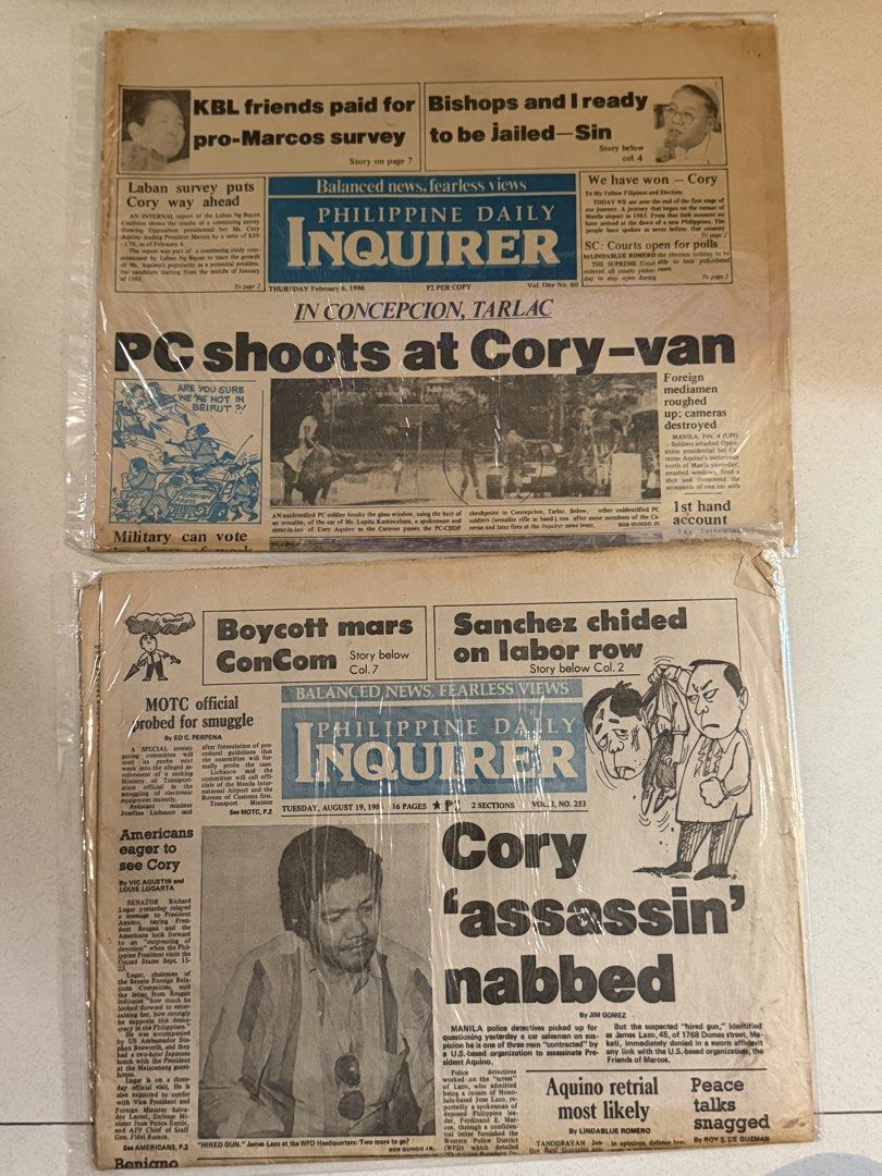 Old Philippine Daily Inquirer Newspapers bundle (Category: Magazines) located in Pasay City. Submitted by gahaman02 (Listing ID 1460963419, Image 1). Description: - Two vintage Philippine Daily Inquirer newspapers. - February 6, 1986 issue: Headline 'PC shoots at Cory-van'. - August 19, 1985 issue: Headline 'Cory 'assassin' nabbed'. - Significant historical artifacts from Philippine political history. - Ideal for collectors and enthusiasts of Phi