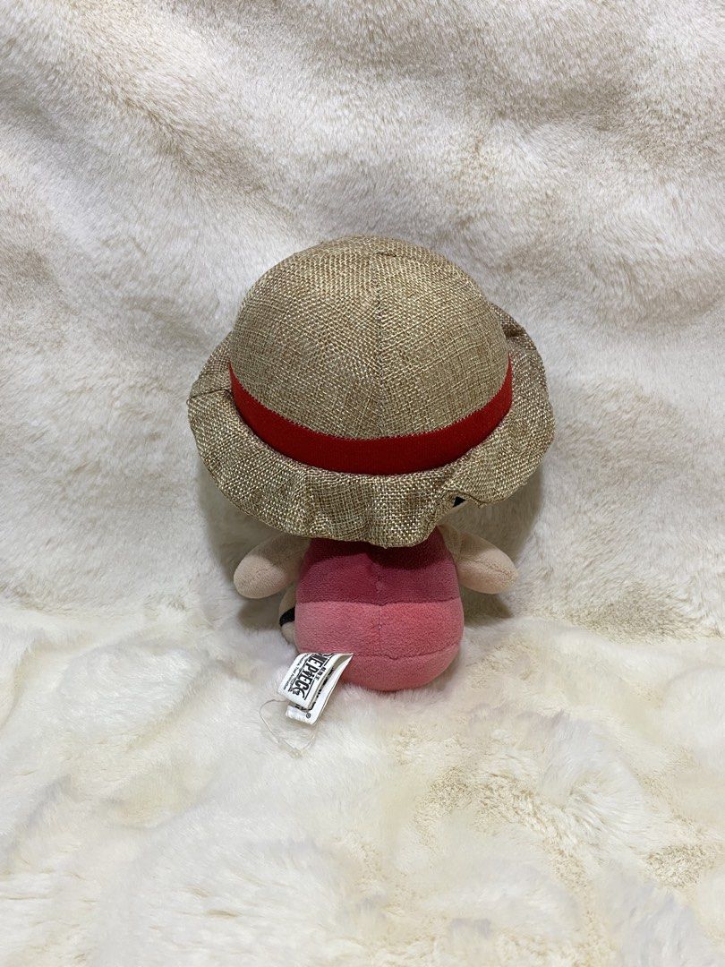 One Piece Monkey D. Luffy Straw Hat Plush Toy (Category: Plushies & Soft Toys) located in Kalibo. Submitted by ollie_stuffshop (Listing ID 1460921828, Image 3). Description: 20cm x 17.5cm Before you send your inquiries: ❗️Last Price is already posted ❗️Manage your expectations, WYSIWYG ❗️May need washing ❗️Dropoff is every Wednesday & Sunday - Adorable Monkey D. Luffy plush toy from One Piece. - Features his iconic straw hat and a cute pink outfi