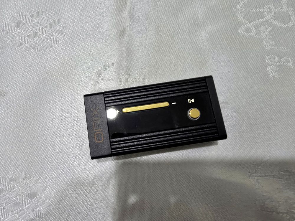 ONIX Alpha XI1 Portable DAC/AMP Adapter (Category: Portable Audio Accessories) located in Kajang. Submitted by bugeca (Listing ID 1461010598, Image 2). Description: - ONIX ALPHA portable DAC/AMP adapter - Elevates your audio quality on the go - Compact and easy to carry - Comes with original packaging - Includes USB-C to USB-C cable (USB-A adapter included) - Tested and confirmed working well - Perfect for audiophiles seeking an improved listenin