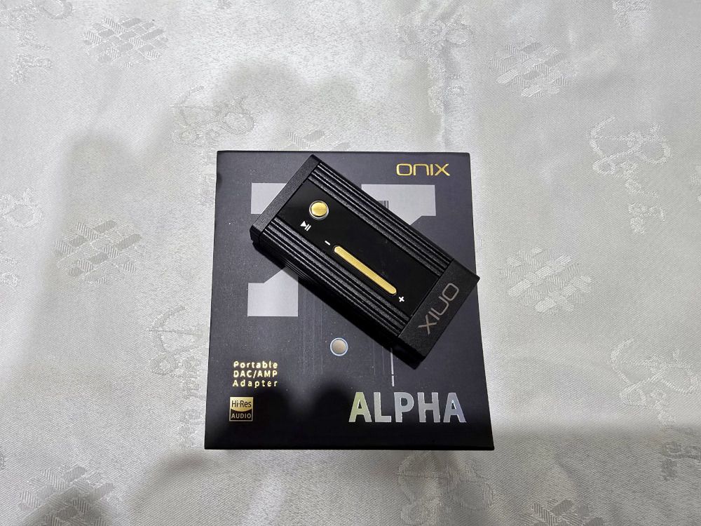ONIX Alpha XI1 Portable DAC/AMP Adapter (Category: Portable Audio Accessories) located in Kajang. Submitted by bugeca (Listing ID 1461010598, Image 1). Description: - ONIX ALPHA portable DAC/AMP adapter - Elevates your audio quality on the go - Compact and easy to carry - Comes with original packaging - Includes USB-C to USB-C cable (USB-A adapter included) - Tested and confirmed working well - Perfect for audiophiles seeking an improved listenin