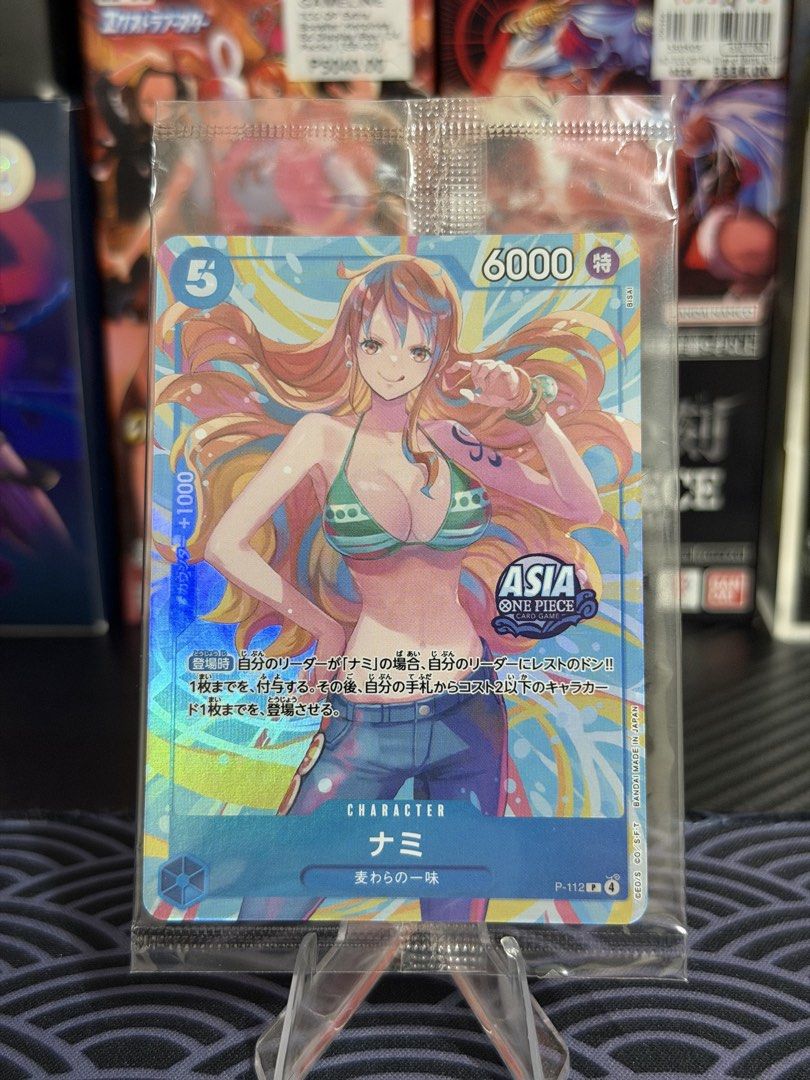 OPTCG Nami P-112 Asia (Category: Raw Singles) located in Los Banos. Submitted by _skymi (Listing ID 1460945853, Image 1). Description: Loc: Laguna Mod: Lbc/Lalamove/Jnt Meetup: Santa Rosa/Los Baños.
