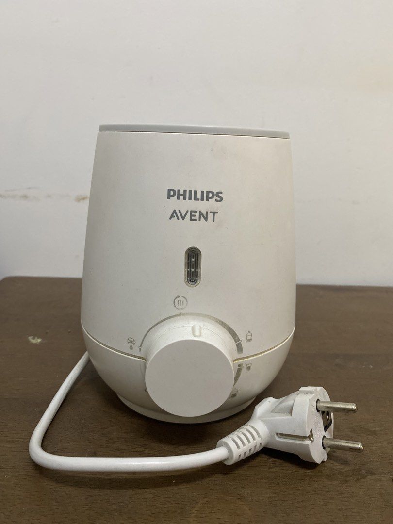 Original Philips Avent Fast Bottle Warmer (Category: Breastfeeding & Bottle Feeding) located in Dagupan City. Submitted by pleasantries (Listing ID 1461021884, Image 1). Description: Well Used No damage but prints have lightly faded .